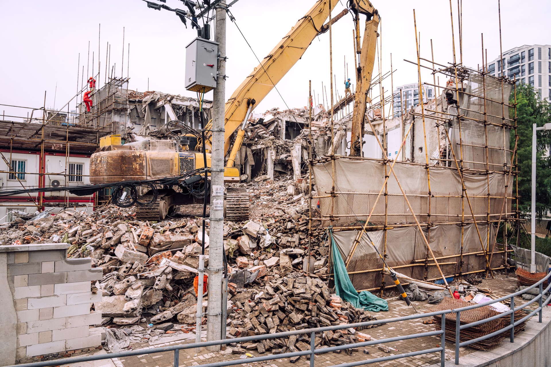 Urban Building Demolition Site with Heavy Machinery in Shanghai