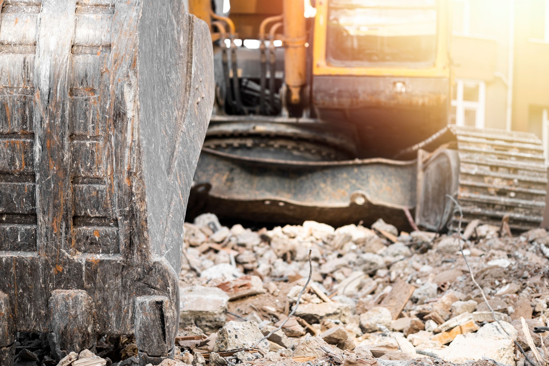 Hydraulic crusher excavator backoe machinery working on site demolition